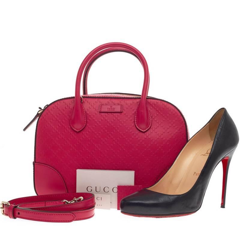 This authentic Gucci Bright Convertible Top Handle Diamante Leather is sophisticated and modern in style perfect for everyday use. Crafted in Gucci’s diamante leather in vivid fuschia pink, this bag features dual-rolled handles, protective base