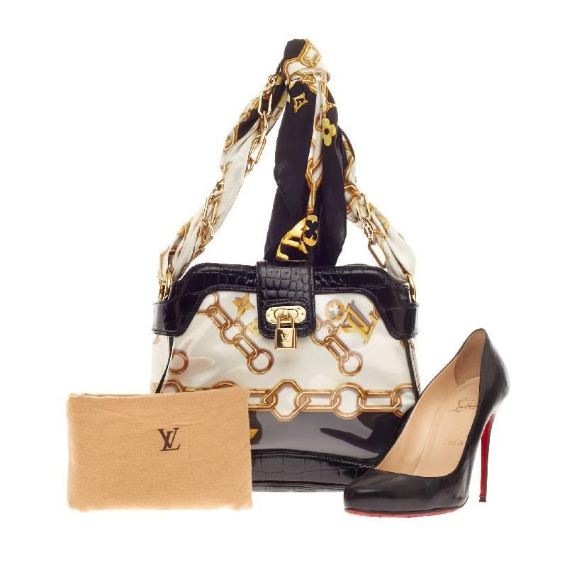 This authentic limited edition Louis Vuitton Linda Charms Scarf Bag Monogram Silk with Alligator Trim from the brand's Spring /Summer 2006 Collection exudes a luxurious summer night style. Constructed in protective coated PVC with silk print and