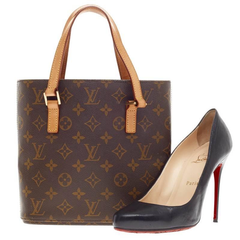This authentic Louis Vuitton Vavin Tote Monogram Canvas PM is constructed with Louis Vuitton's iconic monogram canvas. Its modern structure makes this the perfect everyday tote, as it will hold all of your daily essentials. It is accented with