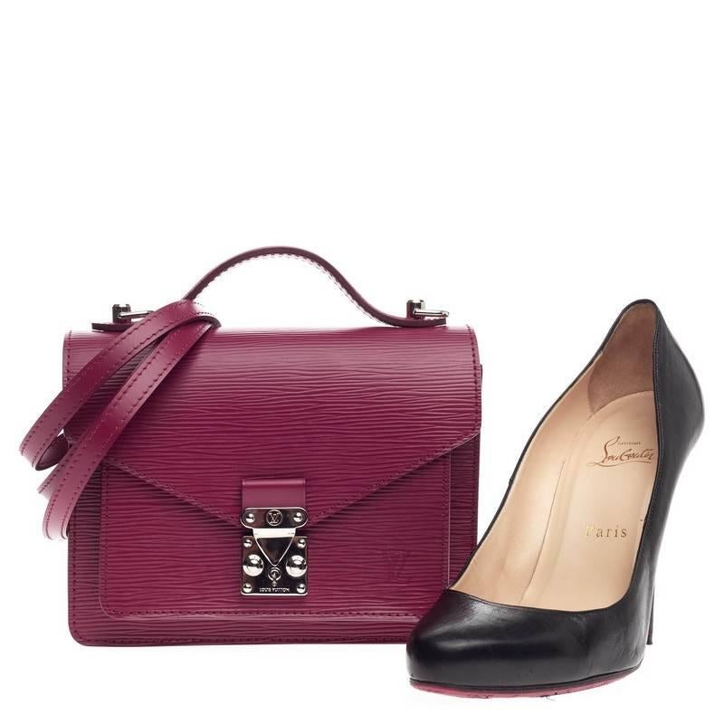 This authentic Louis Vuitton Monceau Briefcase Epi Leather BB is cute and feminine, perfect for when you need to travel light. Crafted from fuschia epi leather, this chic and sophisticated bag features leather top handle, removable/adjustable long
