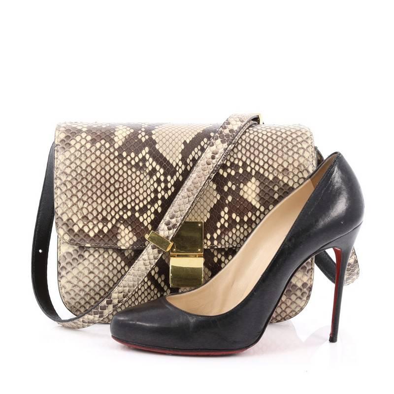 This authentic Celine Box Bag Python Medium presented in the brand's Spring/Summer 2012 Collection is a modern reinterpretation to Celine's classic box bags. Crafted from beige and brown genuine python, this simple, front flap design features an