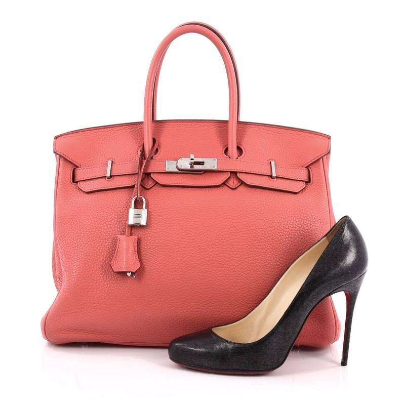 This authentic Hermes Birkin Handbag Bougainvillea Clemence with Palladium Hardware 35 is synonymous to traditional Hermes luxury. Crafted with sturdy, scratch-resistant bougainvillea red clemence leather, this eye-catching luxurious tote is