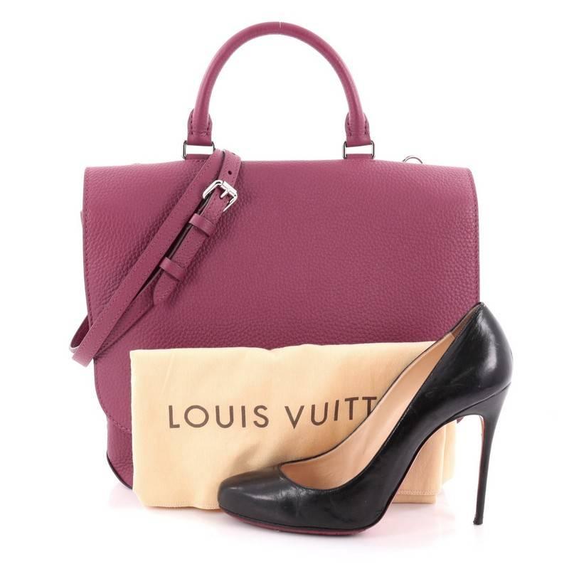 This authentic Louis Vuitton Volta Handbag Leather presented in the brand's Spring/Summer 2015 Collection updates its modern, minimalistic design following the popular Capucines line. Crafted from supple, purple leather, this elegant satchel