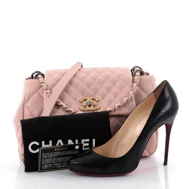 This authentic Chanel Mix Accordion CC Flap Bag Quilted Glazed Calfskin Medium is a classic design perfect for everyday use. Crafted from luxurious light pink diamond quilted glazed calfskin, this sophisticated flap bag features Chanel's signature