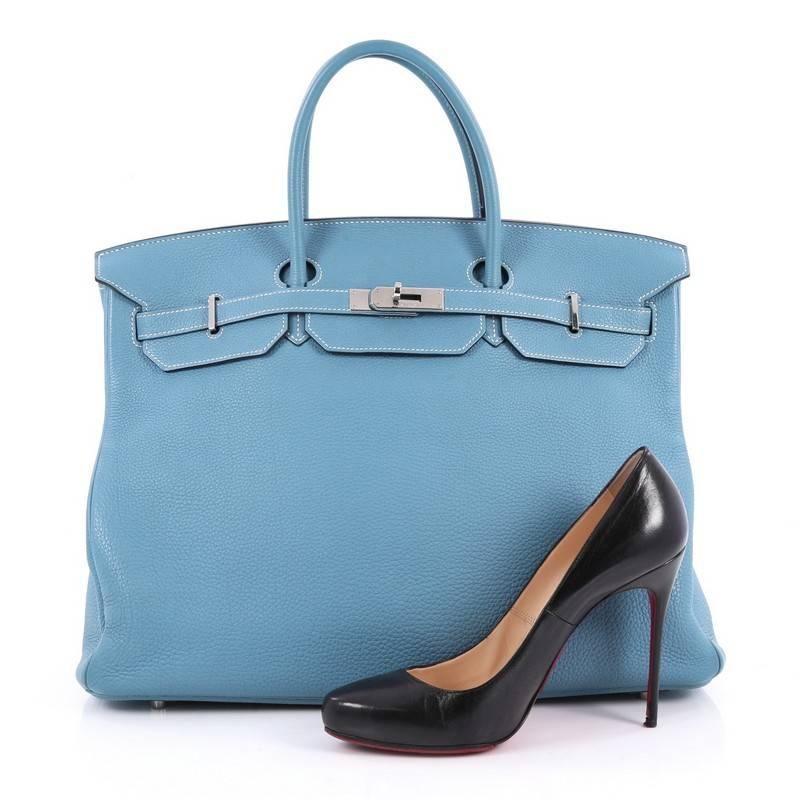 This authentic Hermes Birkin Handbag Blue Jean Togo with Palladium Hardware 40 stands as one of the most-coveted bags fit for any fashionista. Constructed from sturdy, scratch-resistant blue jean leather, this stand-out oversized tote features