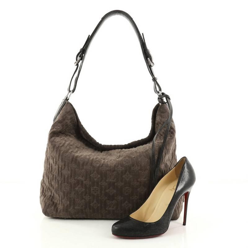 This authentic Louis Vuitton Antheia Hobo Suede PM inspired by the Greek goddess of flowers mixes casual elegance with exquisite craftsmanship. Luxuriously crafted from taupe leather with Louis Vuitton's monogram flower embossed stitching, this