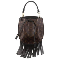 Louis Vuitton Fringed Noe Monogram Canvas with Leather 