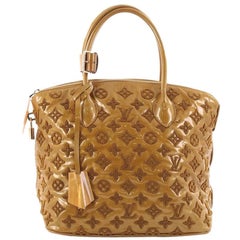 Louis Vuitton Fascination Lockit Frame Handbag Patent Lambskin BB at 1stDibs