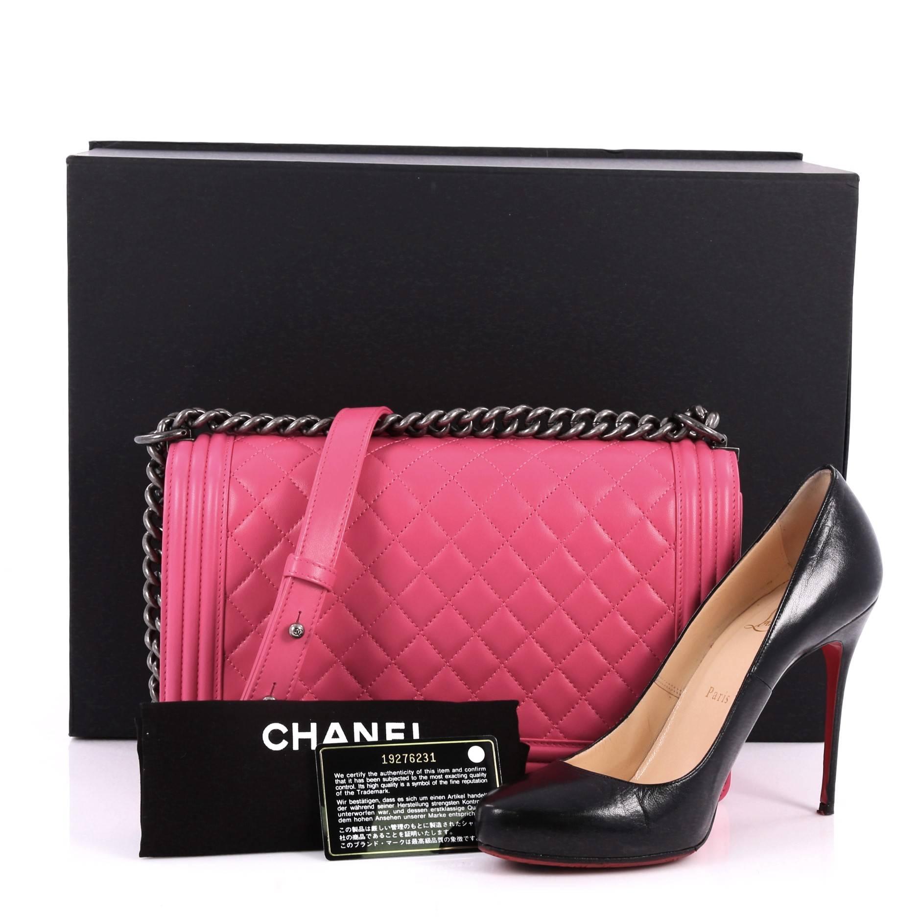 This authentic Chanel Boy Flap Bag Quilted Lambskin New Medium is every woman's dream. Crafted from pink diamond quilted lambskin leather, this enviable Boy flap bag features a chunky chain link strap with shoulder pad, CC Boy logo push-lock
