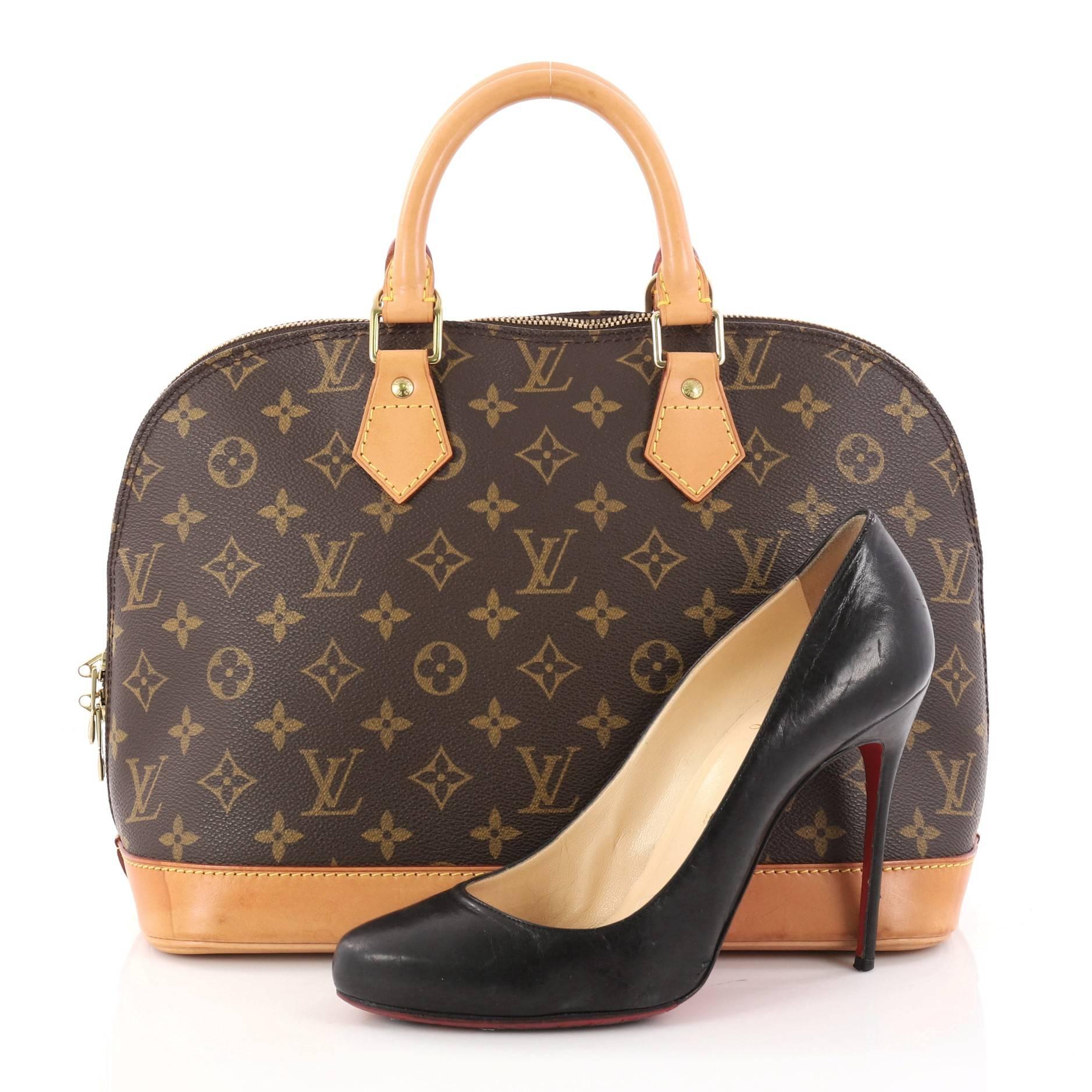 This authentic Louis Vuitton Vintage Alma Handbag Monogram Canvas PM is perfect for everyday use. Crafted in iconic brown monogram coated canvas, this dome-shaped satchel showcases dual-rolled handles, cowhide leather trims, sturdy base and
