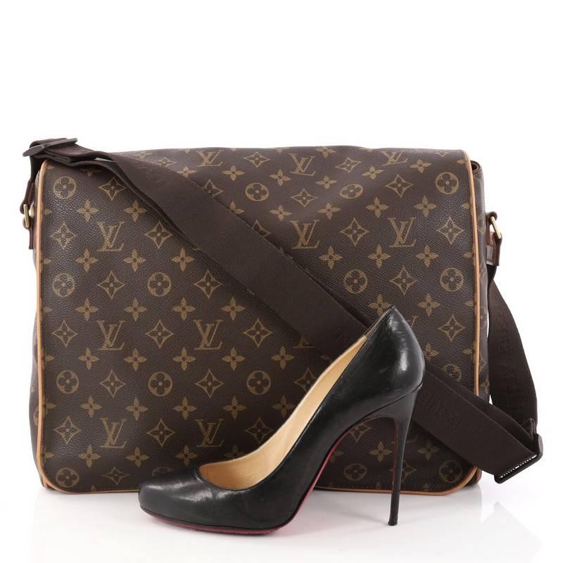 This authentic Louis Vuitton Abbesses Bag Monogram Canvas mixes Louis Vuitton's classic style with luxurious functionality. Crafted from the brand's iconic brown monogram coated canvas, this oversized messenger bag features vachetta leather piping,