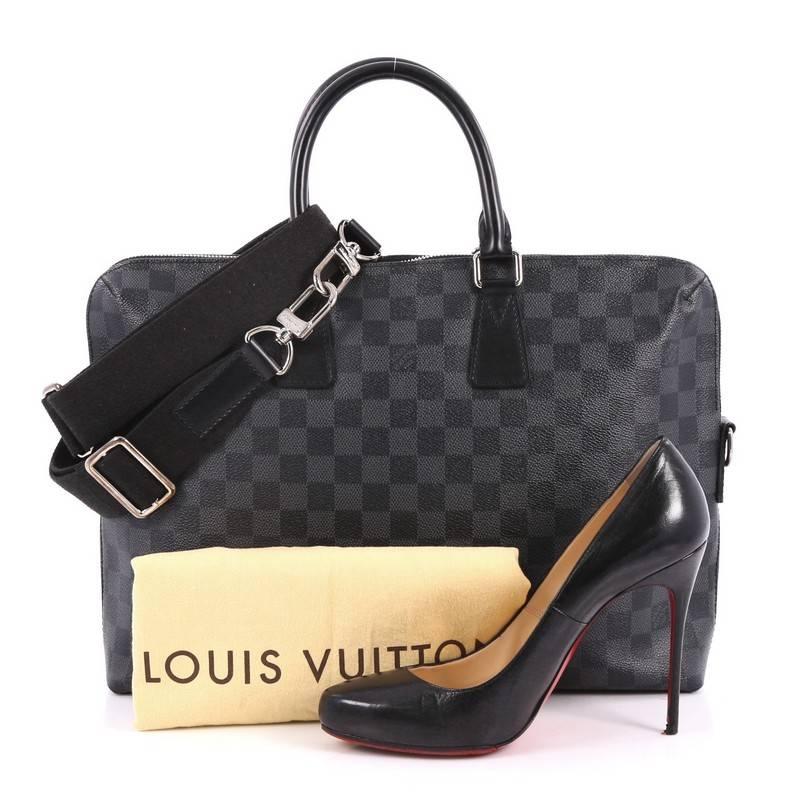 This authentic Louis Vuitton Porte-Documents Jour Bag Damier Graphite is perfect for daily or business excursions. Crafted from the brand's iconic damier graphite coated canvas, this stylish and functional bag features dual-rolled leather handles,