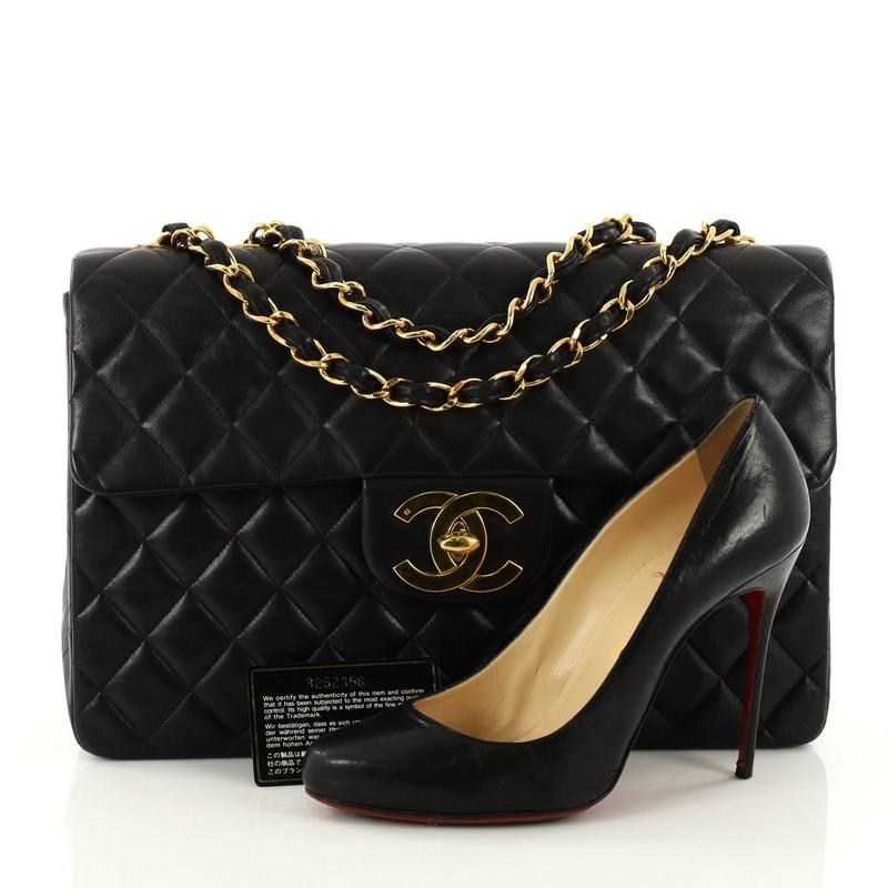 This authentic Chanel Vintage Classic Single Flap Bag Quilted Lambskin Maxi is a timeless essential for any modern woman. Crafted in black quilted lambskin leather, this classic flap bag features woven-in leather chain strap, exterior back pocket,
