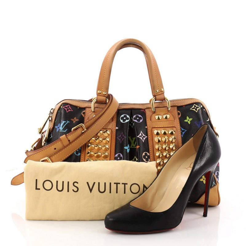 This authentic Louis Vuitton Courtney Bag Monogram Multicolor MM named after the controversial rock n'roll star Courtney Love. Crafted from black multicolor monogram canvas, this bag features dual flat leather handles, natural cowhide leather trims,