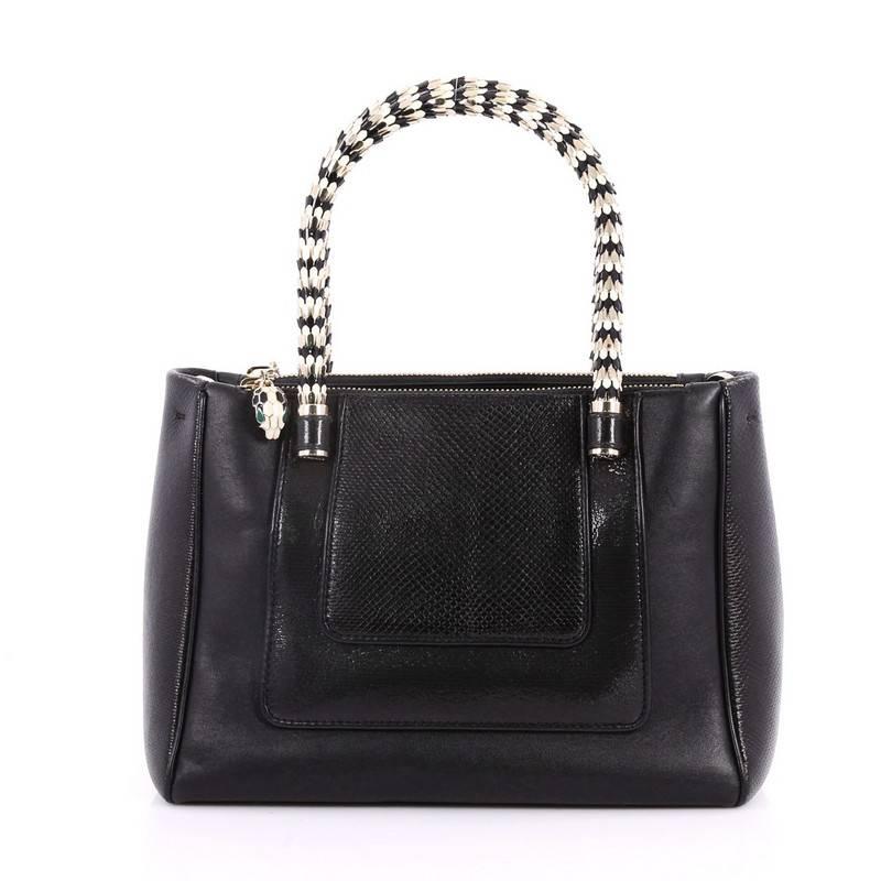 This authentic Bvlgari Serpenti Double Zip Tote Leather and Python Small is a gorgeous bag perfect for the most sophisticated fashionista. Crafted in black leather and genuine python skin, this bag features dual enamel scaled handles, detachable