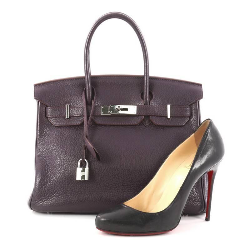 This authentic Hermes Birkin Handbag Raisin Clemence with Palladium Hardware 30 stands as one of the most-coveted bags fit for any fashionista. Constructed from sturdy, scratch-resistant Raisin Clemence leather, this stand-out oversized tote