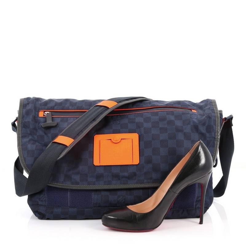 This authentic Louis Vuitton Challenge Messenger Damier Nylon combines classic Louis Vuitton design cues with the latest in high tech materials. Crafted from blue damier nylon, this messenger bag features an adjustable shoulder strap with