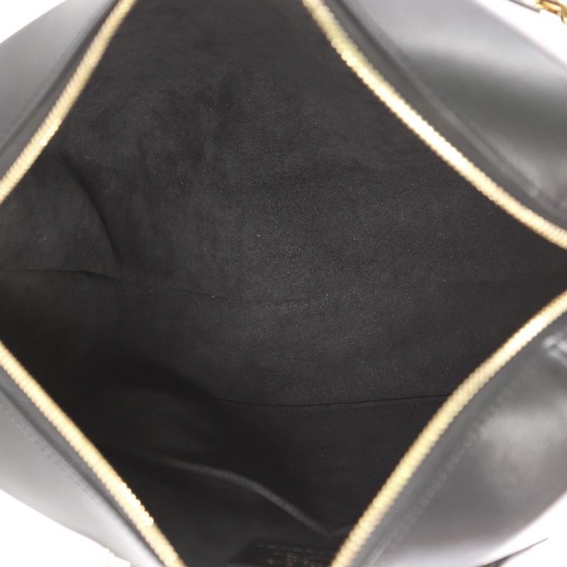 Women's or Men's Louis Vuitton City Malle Reverse Monogram Canvas and Leather MM Handbag 