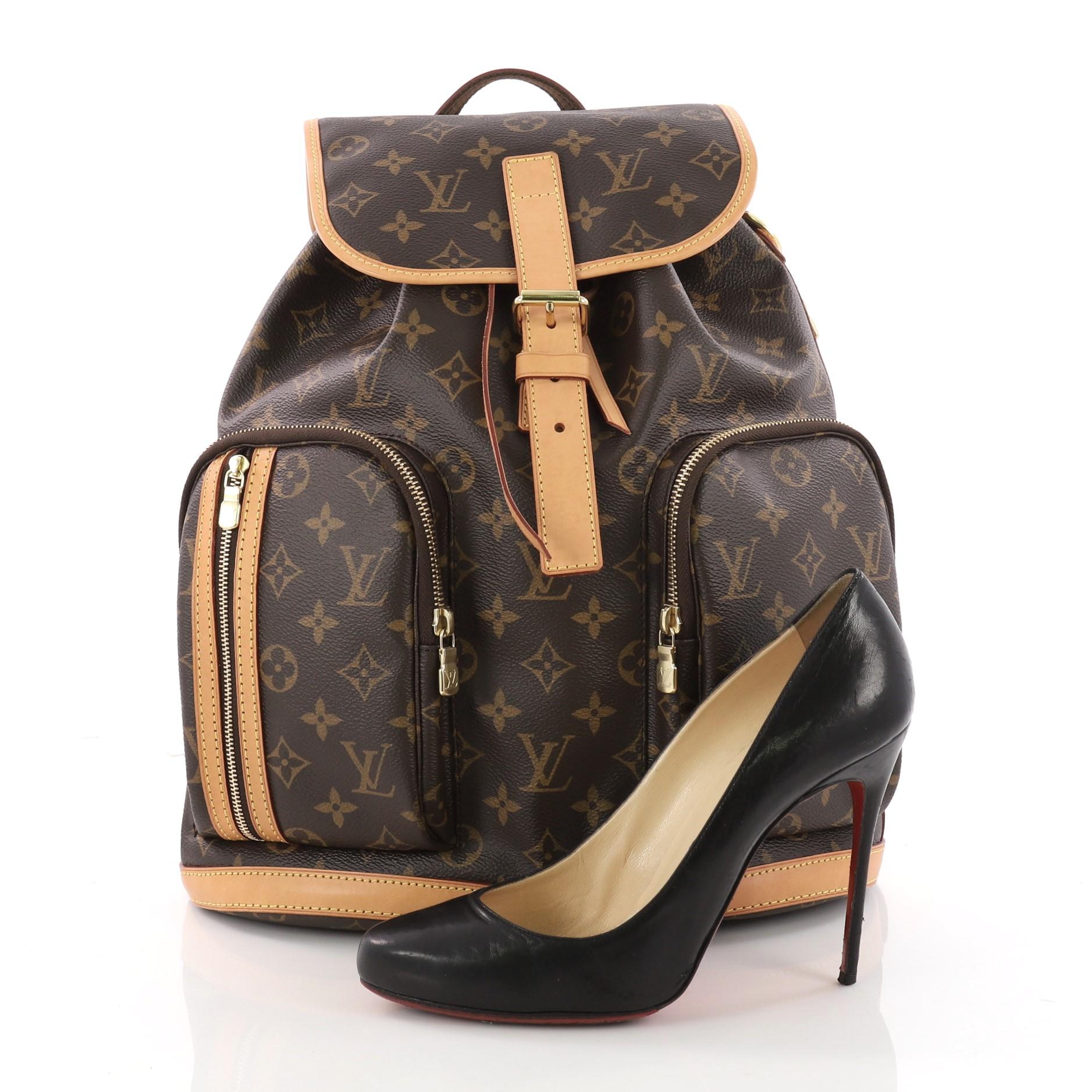 This authentic Louis Vuitton Bosphore Backpack Monogram Canvas is perfect for on-the-go fashionistas. Crafted from Louis Vuitton's brown monogram coated canvas with vachetta leather trims, this chic backpack features exterior front zip pockets, dual