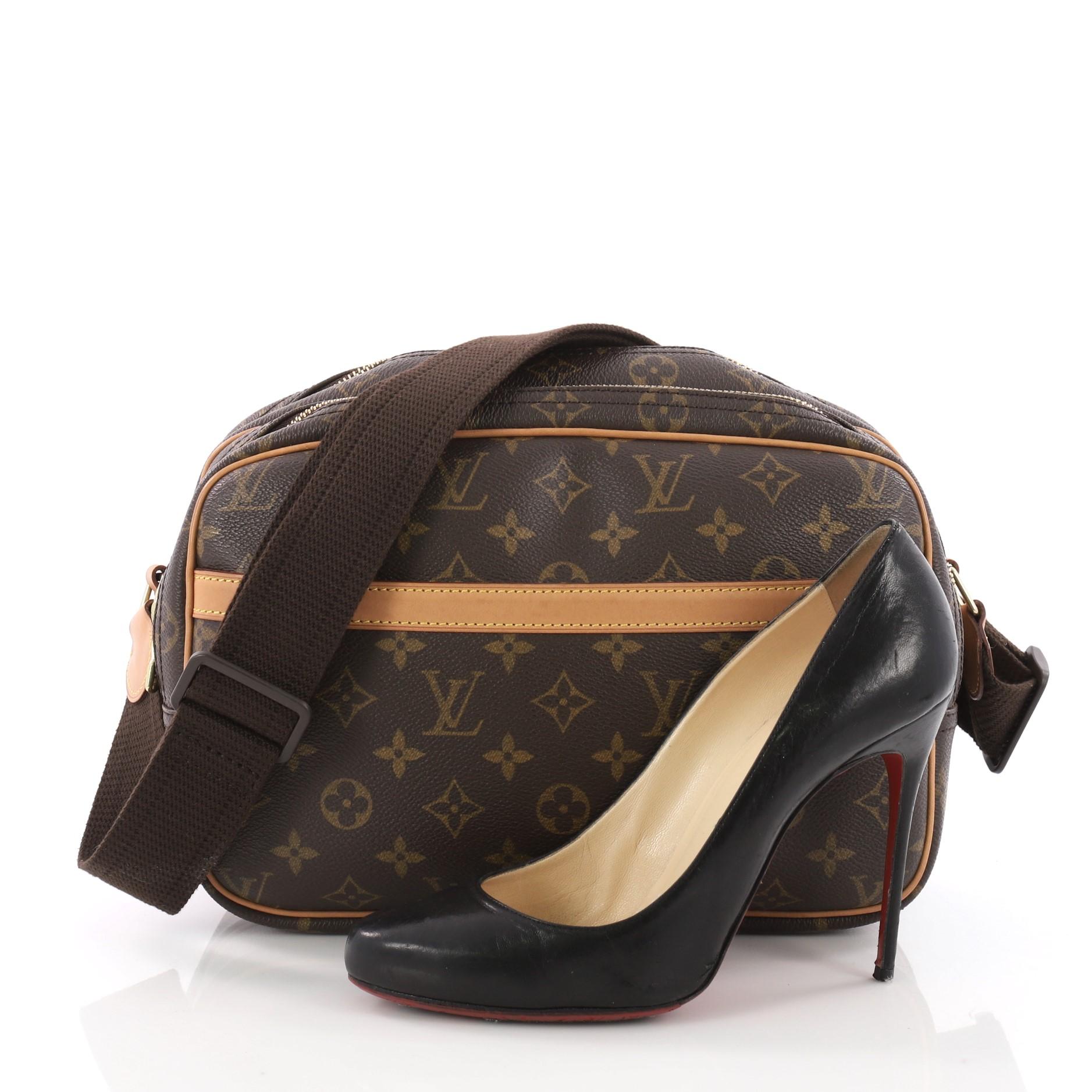 This authentic Louis Vuitton Reporter Bag Monogram Canvas PM is the ideal messenger bag for any fashionista. Crafted in brown monogram coated canvas, this bag features an adjustable wide nylon shoulder strap, vachetta leather trims and gold-tone