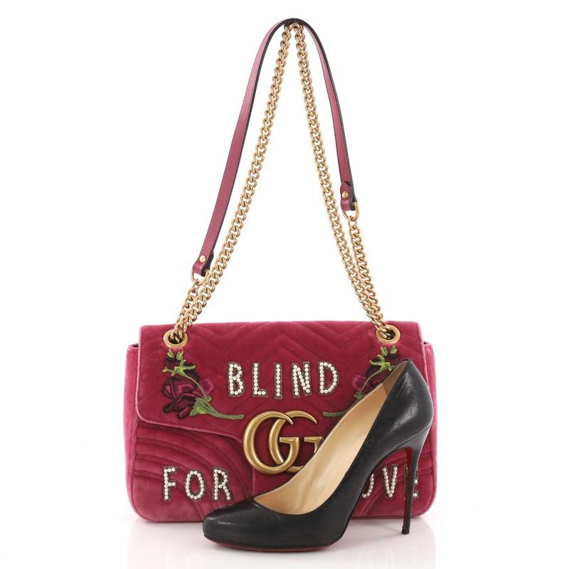 This Gucci GG Marmont Flap Bag Embroidered Matelasse Velvet Medium, crafted in pink matelasse velvet, this bag features chain-link shoulder strap with leather pad, embroidered flowers and lustrous pearls, and aged gold-tone hardware. Its push-lock