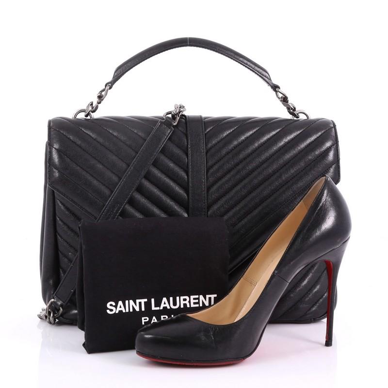 This Saint Laurent Classic Monogram College Bag Matelasse Chevron Leather Large, crafted in black matelasse chevron leather, features a single top handle, long detachable chain strap with shoulder pad, exterior back pocket and aged silver-tone