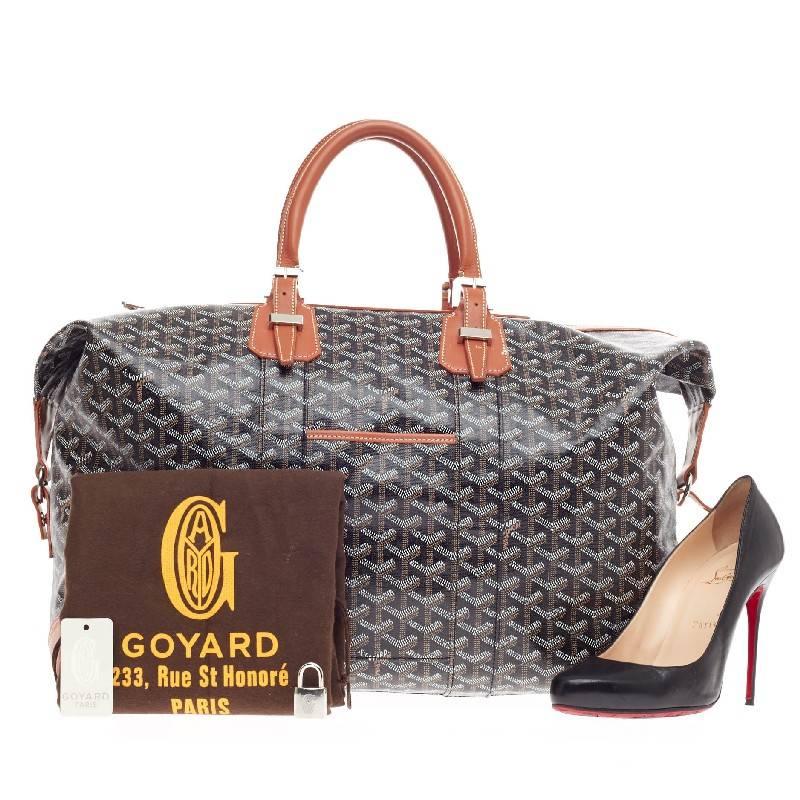 This authentic Goyard Boeing Travel Bag Canvas 45 is an exclusive chic travel companion perfect for every fashionista. Crafted from Goyard's iconic black, white and brown chevron print in coated canvas, this luxurious travel bag features dual-rolled
