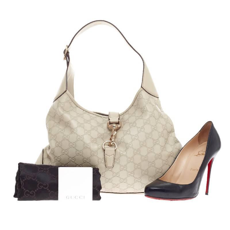 This authentic Gucci Jackie O Guccissima Leather Medium is a must-have luxurious everyday hobo fit for the modern woman. Constructed from white guccissima leather, this iconic reinterpretation features an adjustable shoulder leather strap and