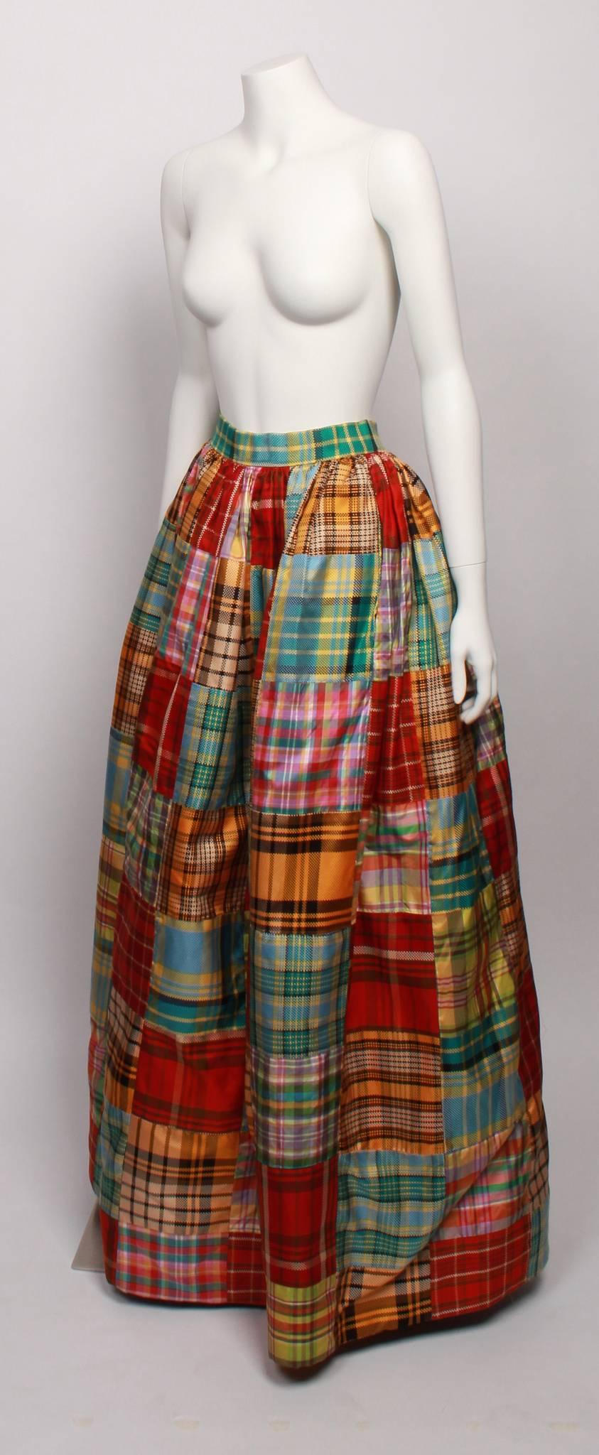 Rare and unique OSCAR DE LA RENTA Patchwork Ball Skirt in multi coloured checked patchwork silk squares. 
Features beautifully finished tulle petticoat under skirt with stiffened hemline for added fullness, and hook and eye closure. 
Full length