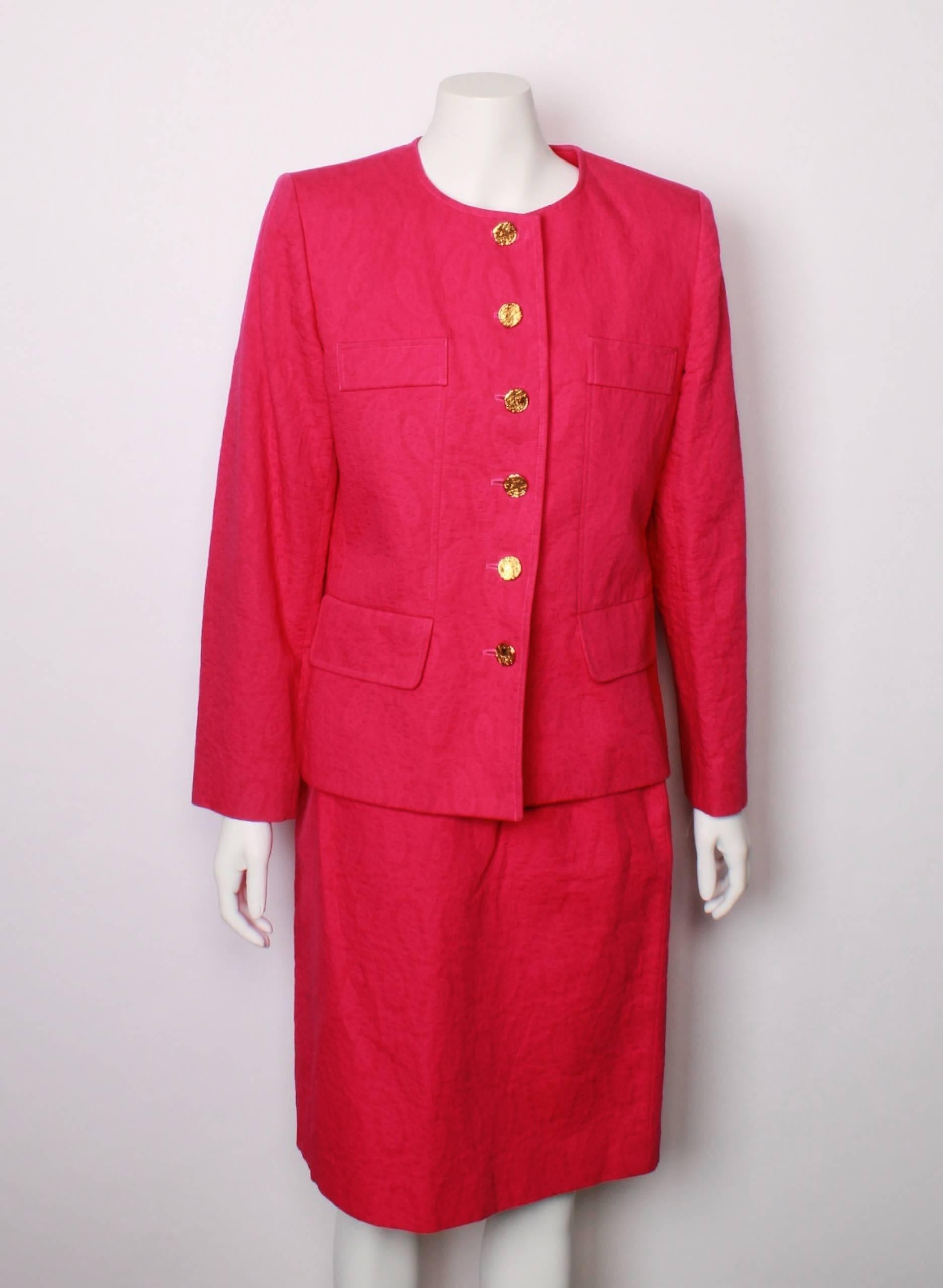 Yves Saint Laurent Variation 1980's   orchid pink cotton jacquard single breasted jacket and pencil skirt suit ensemble. Features beautiful ornate gold buttons and feature pockets. Jacquard has paisley pattern.
Jacket and skirt are fully lined. 
A
