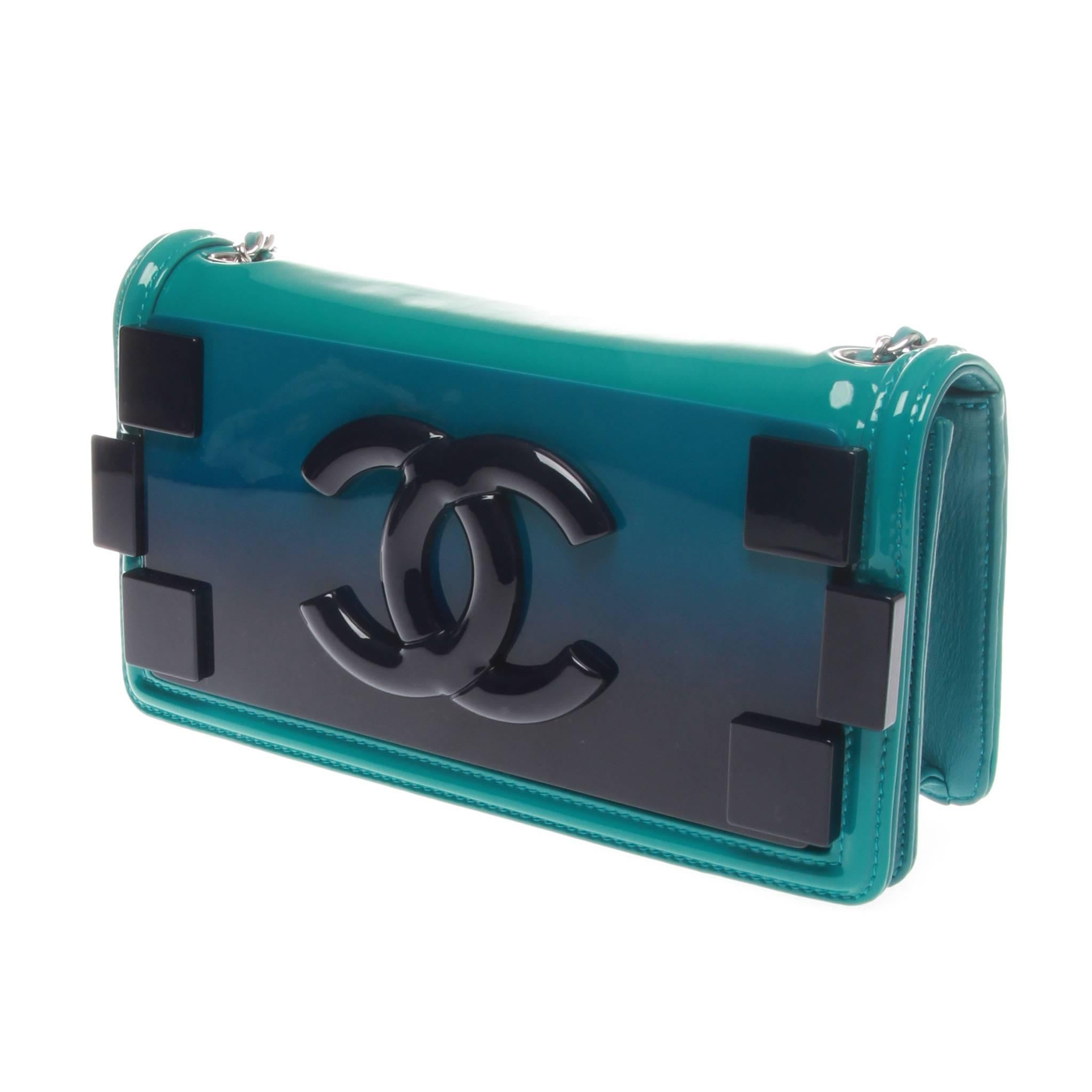 CHANEL Turquoise Iridescent Plexiglass Lego Boy Brick Flap Bag from the Spring/Summer 2014 Collection.

Teal quilted patent leather Chanel boy bag with silver-tone hardware, single shoulder strap with chain-link and leather accents, blue ombré resin
