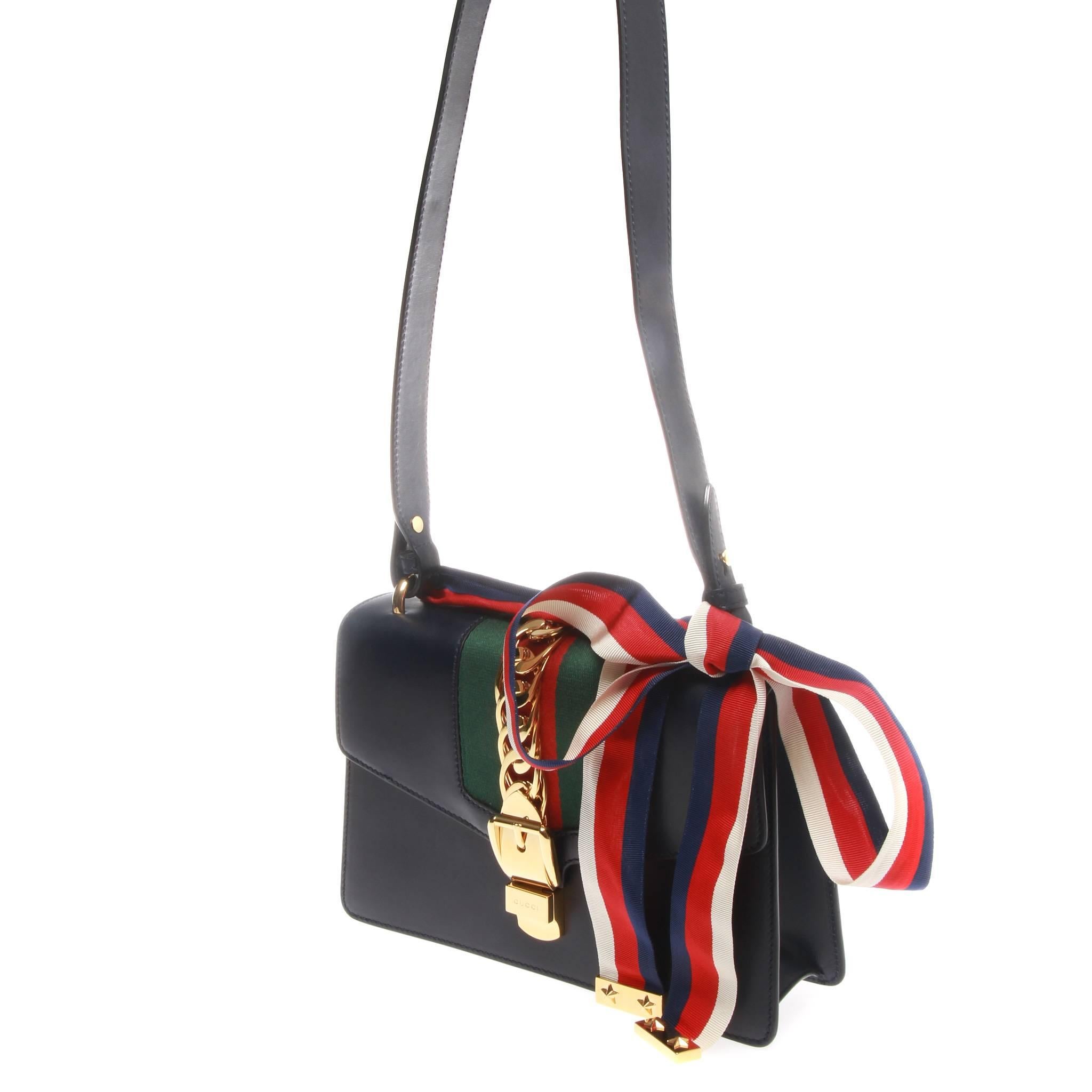 
GUCCI Sylvie Leather Shoulder Bag

A most-wanted Sylvie leather shoulder bag by GUCCI.
This beautiful bag features two interchangeable straps, one in leather the other in blue/red web ribbon. 
The metal buckle closure was taken from the House’s