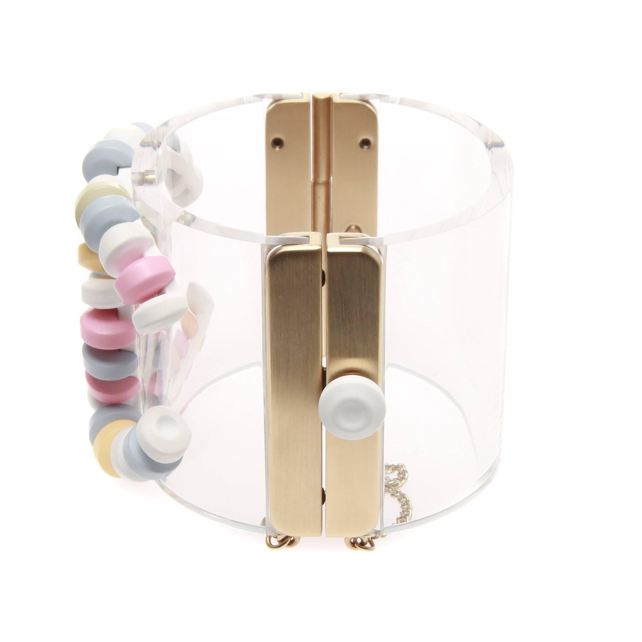 Sweet Candy Signature CC Cuff Multi Colour Lucite Clear Bracelet
Fun and vibrant piece of jewellery.
Can be casual or formal.
Exterior condition: Excellent condition very minimal signs of wear on the hardware (a few speckles of