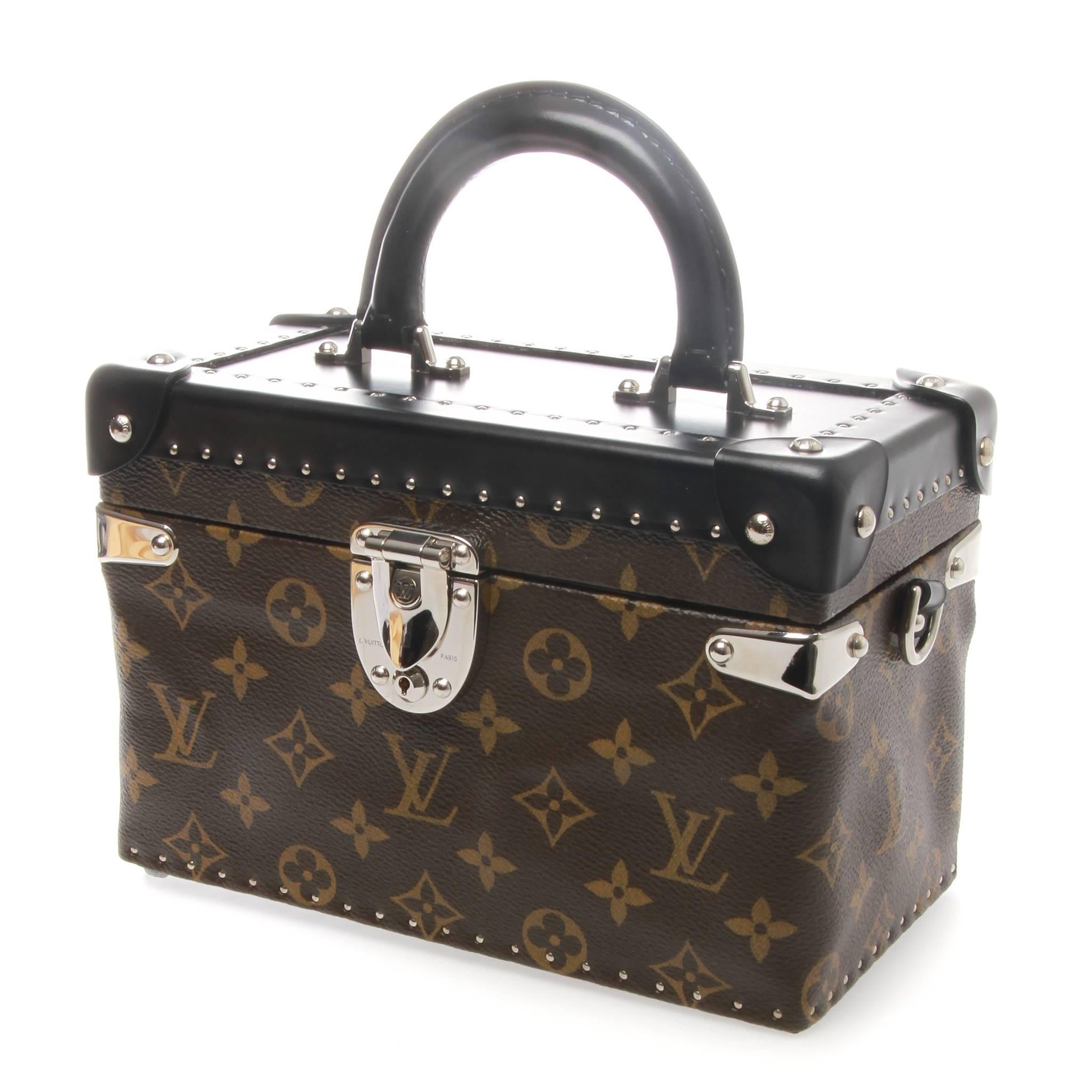 Louis Vuitton City Trunk PM from the Fall 16 ready-to-wear collection. Featuring brown and tan monogram coated canvas, silver-tone hardware, black smooth cowhide trim, single padded top handle, detachable flat shoulder strap, stud embellishments