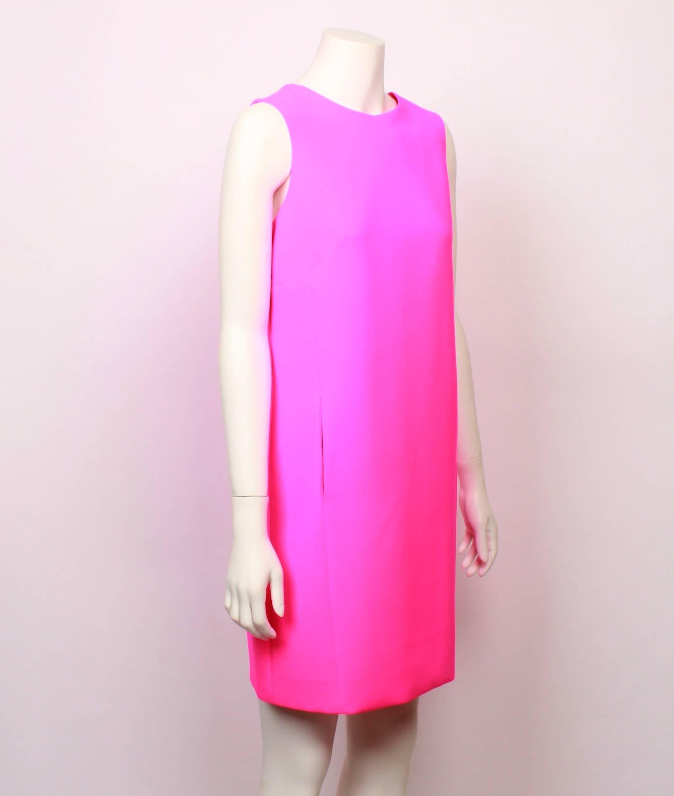 Retro style  Fendi shift mini dress in neon pink. Features in seam pockets, centre back inverted pleat and buttoned tab. Buttons are white with a gold rim. Invisible zipper closure. Fully lined. 
Made in Italy. Size M.