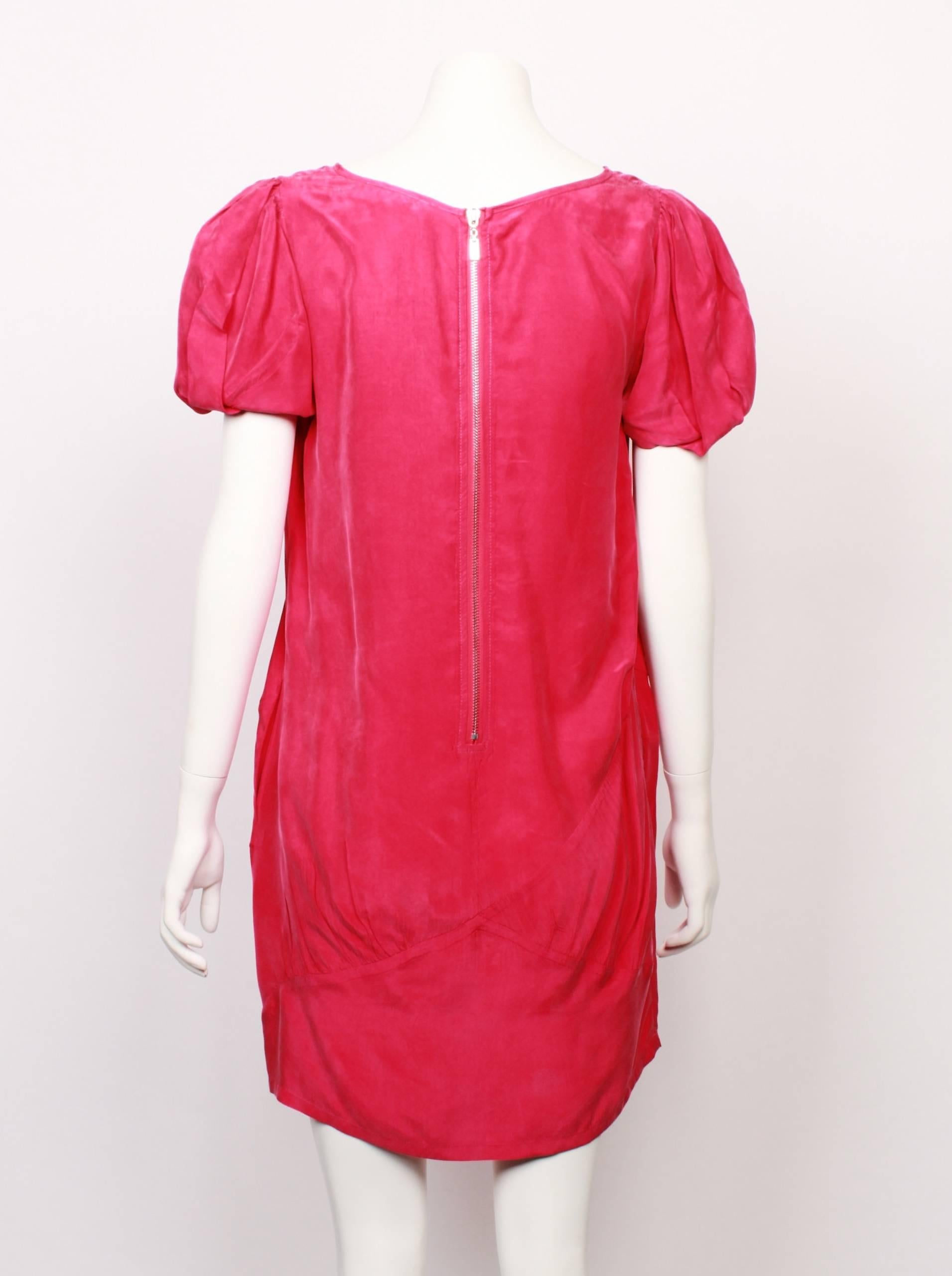 Hot pink Marni mini shift dress. Dress has a short slightly puffed sleeve and a feature chunky metal zipper closure. Made in Italy. 100%  silk charmeuse. Size 40.