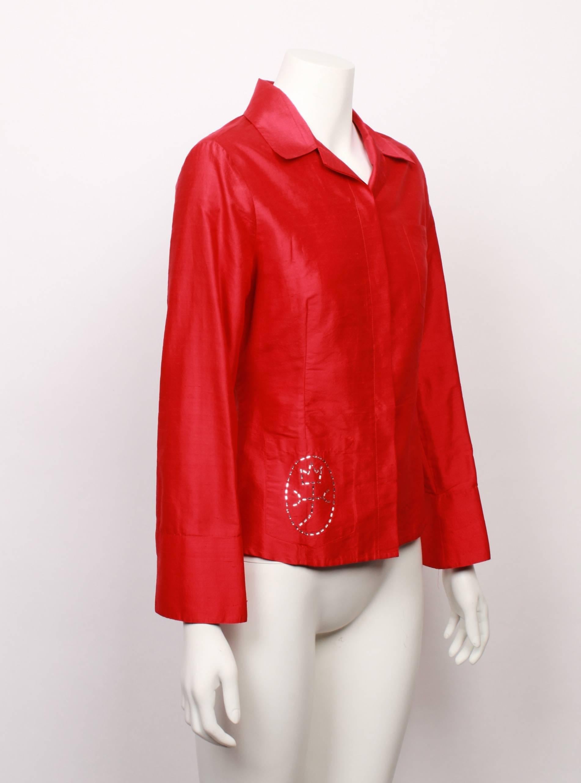 Castelbajac red silk dupion shirt with rhinestone floral feature. The shirt has a concealed button placket, cuffs with split detail , turn back flat collar and a breast pocket. 