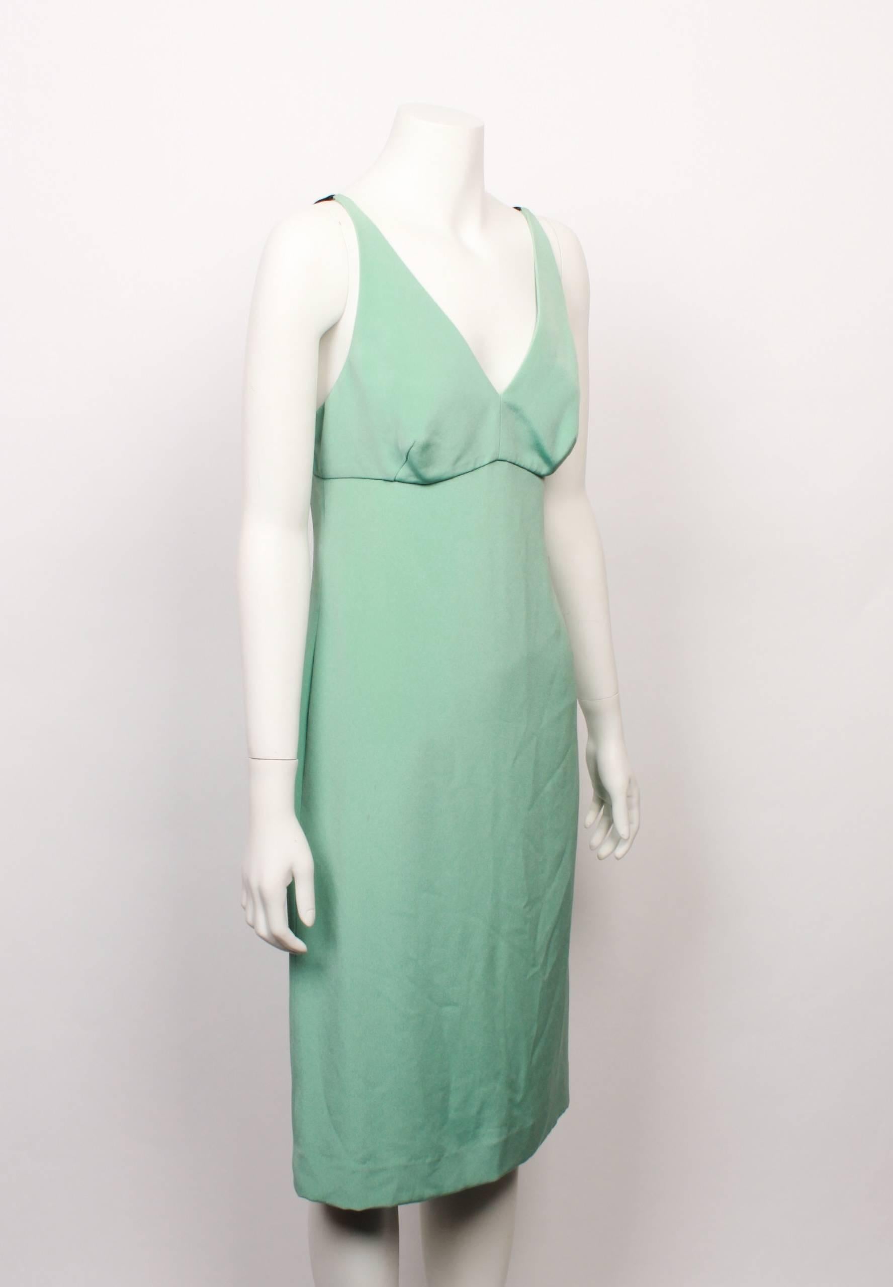 Classic Dolce & Gabbana spearmint green 100% silk slip dress with adjustable black underwear style straps. Back invisible zip closure and hook and eye fastening. Made in Italy. Size 42.
