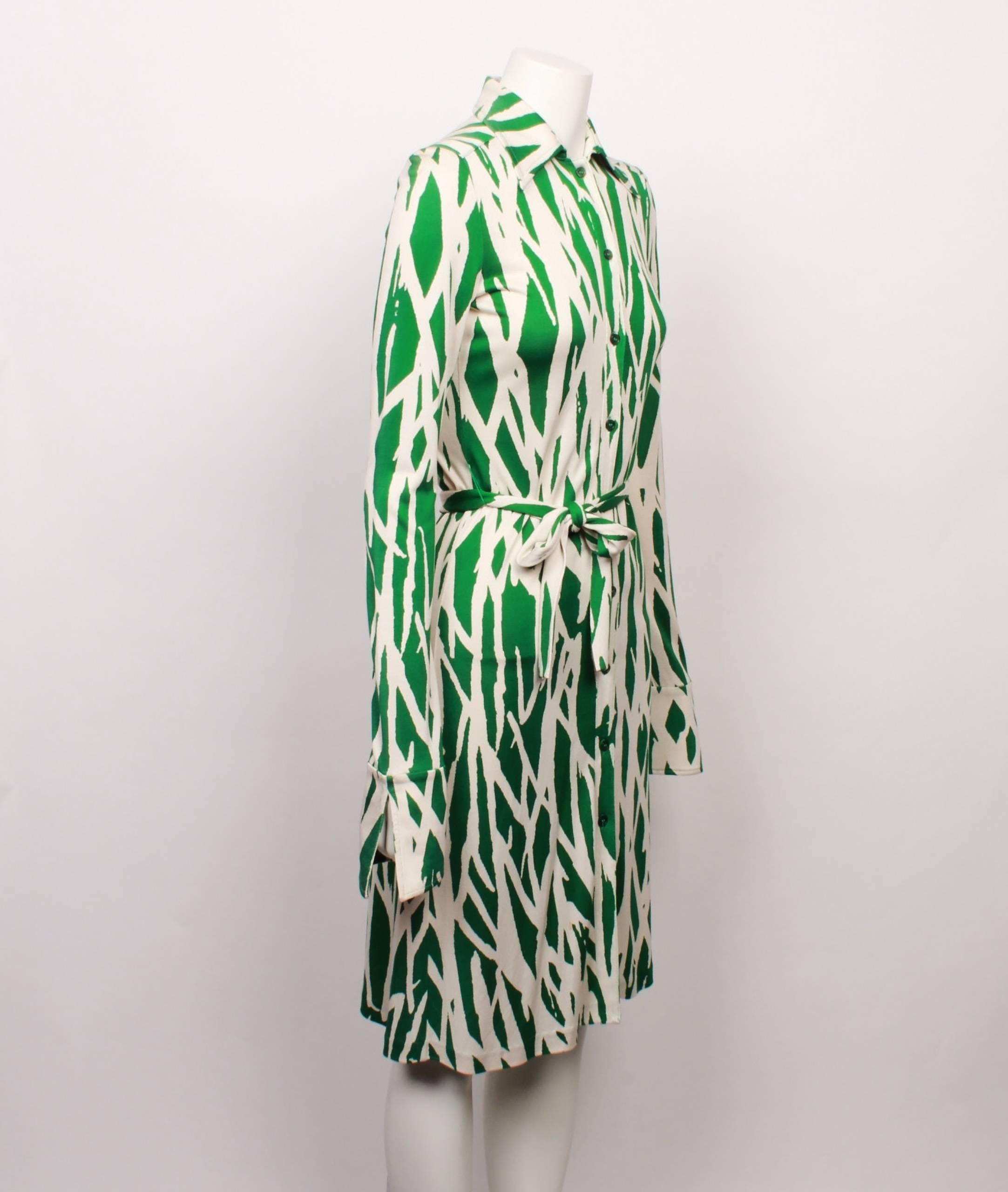 Diane Von Furstenburg iconic style knee length shirt dress in 100% silk jersey. 

The Diane Vintage Collection was released in 2011 and features DVF cult dress styles and prints. This was one of the headline pieces from the first collection and a re