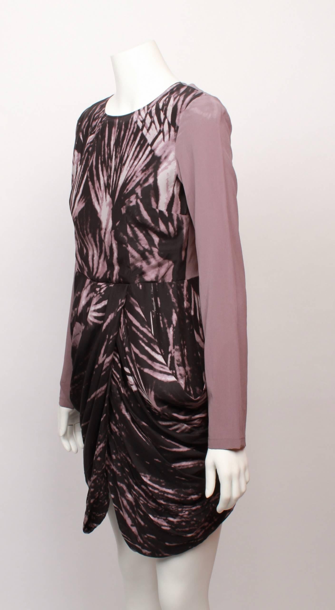 Uber cool Givenchy draped long sleeve mini dress made from tie dye print abstract leaf printed fabric in hues of chocolate and mushroom. The long fitted sleeves and back are in a contrasting solid mushroom coloured fabric. 
Bodice is a fitted shell