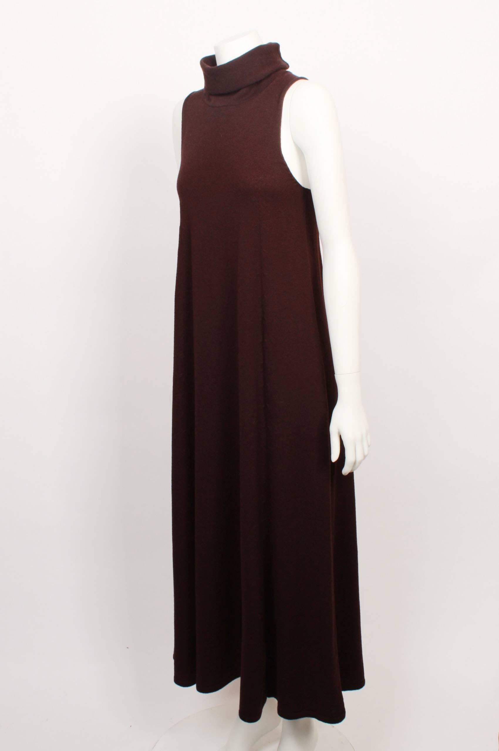 Yohji Yamamoto sleeveless dress with roll neck collar and flared hemline.
3/4 length in rich burgundy wool knit. Made in Japan. Size M.
