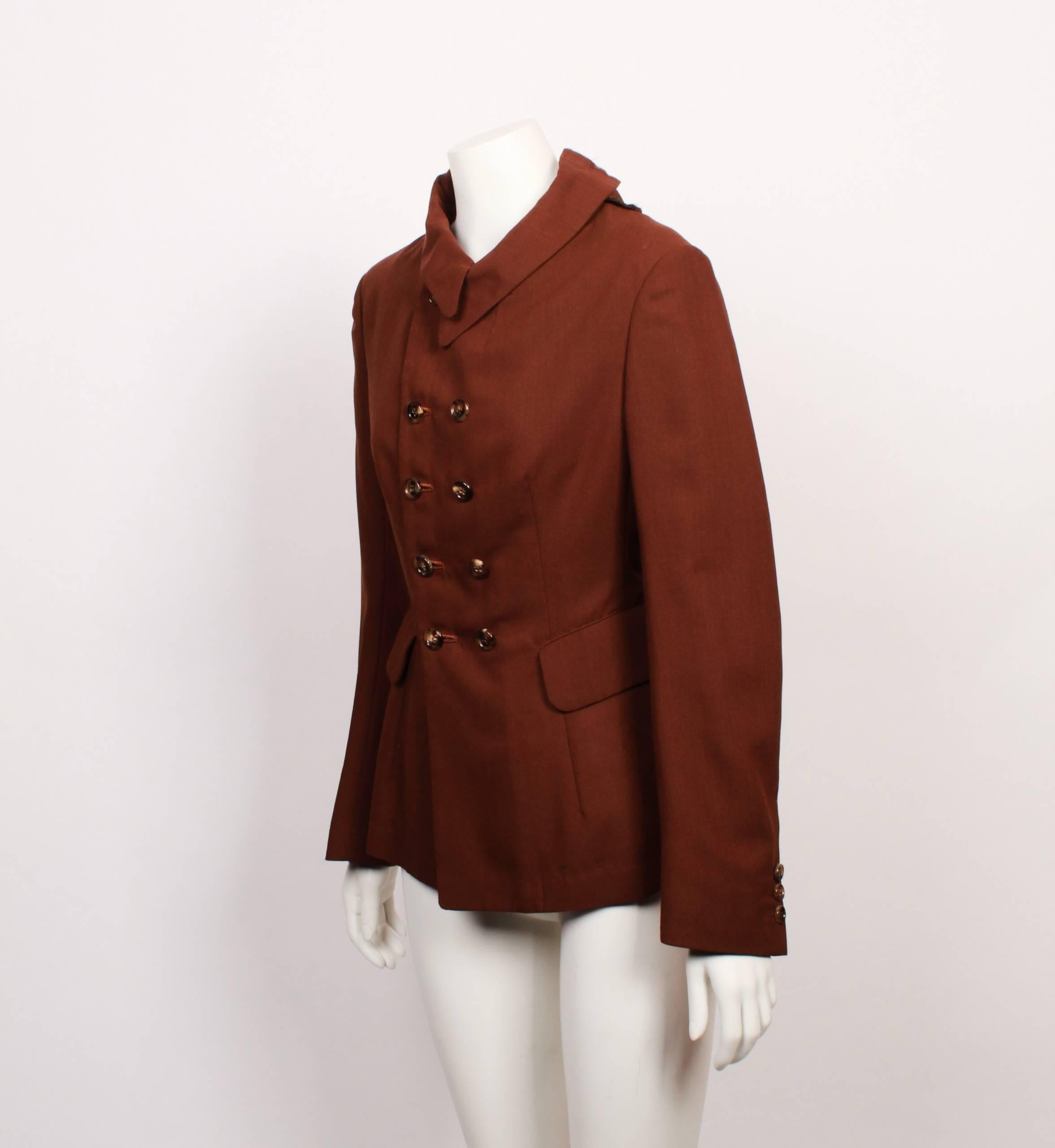 Chocolate Brown Double Sided Jacket.
Button detailing down front side & back side. 
Deconstructed shoulder detail. 