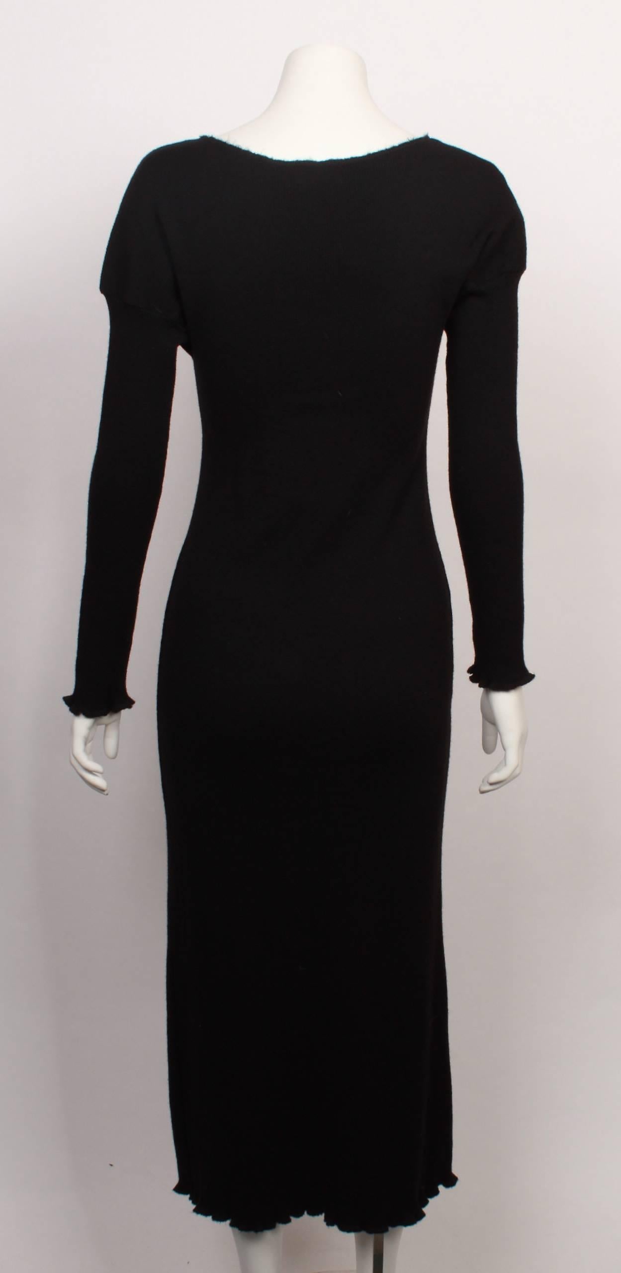 FINAL SALE
Madam Virtue & Co

Black Stretch Wool Tube Dress.