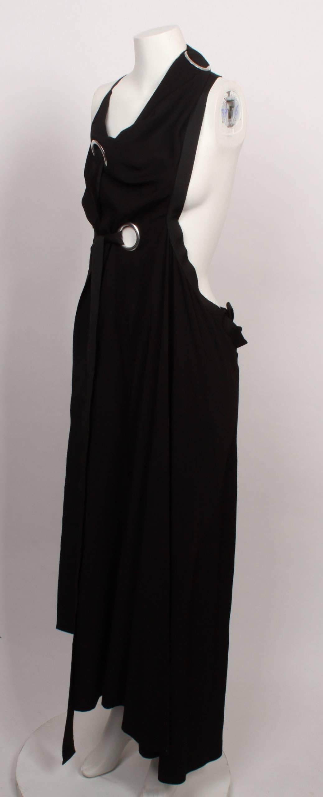 Amazing Yojhi Yamamoto asymmetric eyelet halter gown with oversized nickel eyelets and wide grosgrain ribbon for fastening. Can be worn various ways. 
