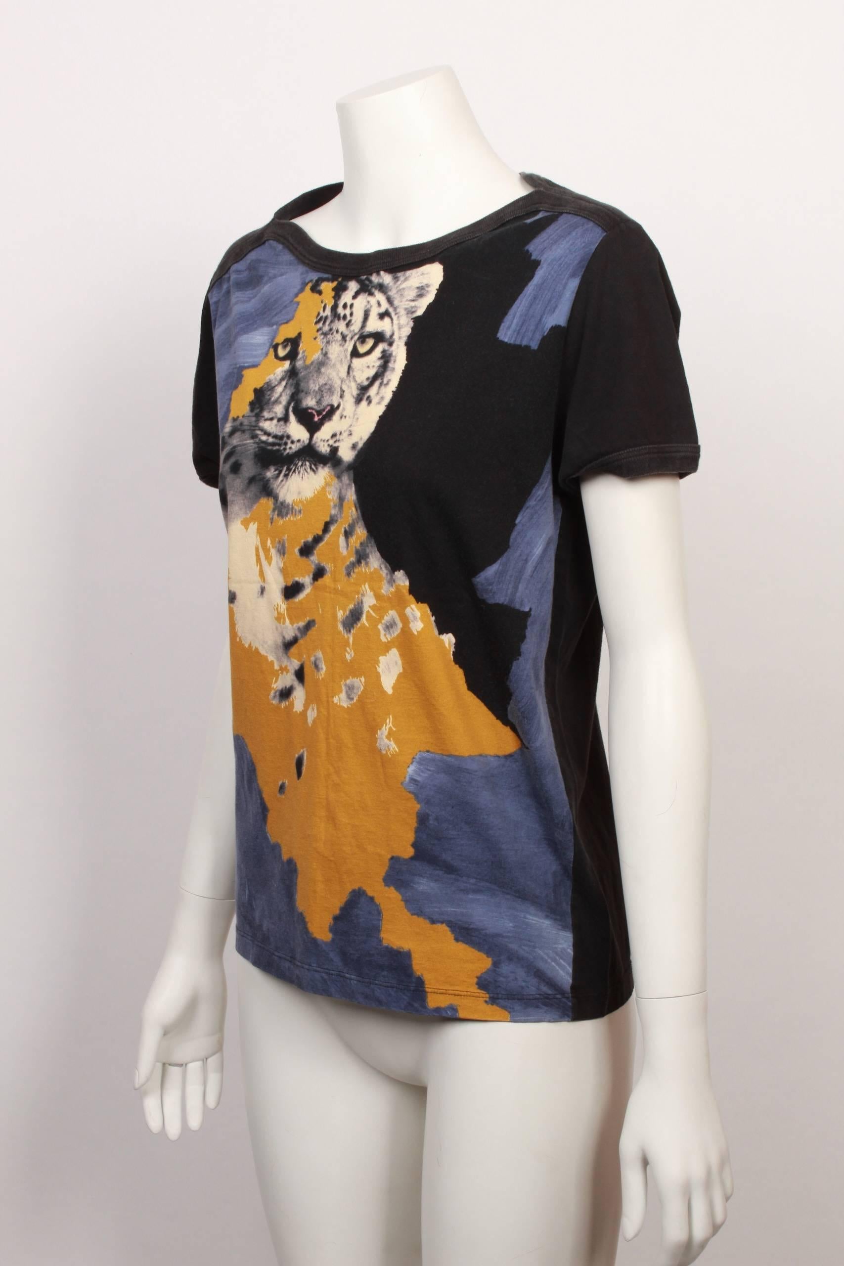 Jean Paul Gaultier Maille Leopard T-Shirt with boat neck and leopard and paint stroke graphic. 
Black base with orange and blue print. 
