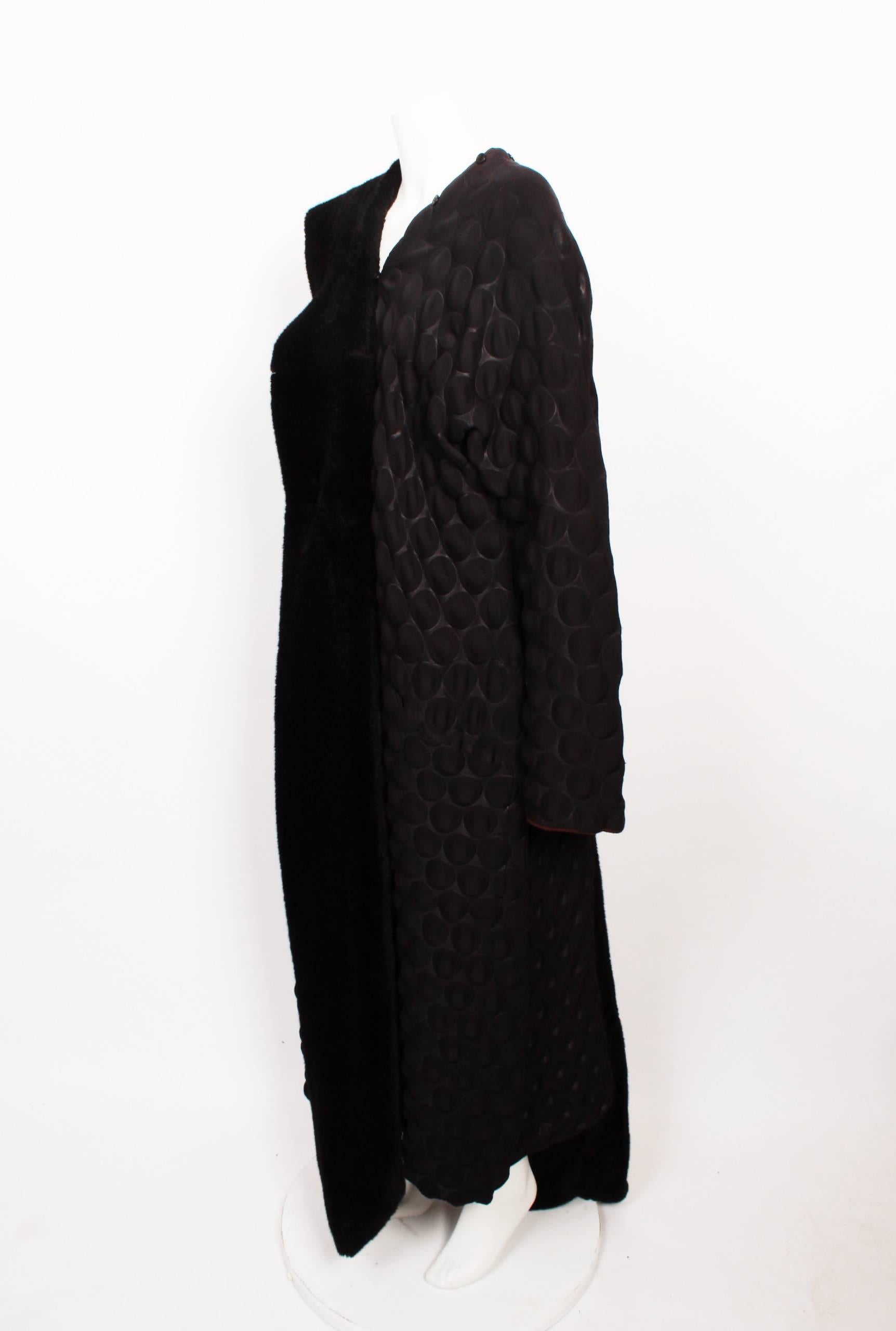 FINAL SALE

Rare Runway Egg crate 3-D embossed Issey Miyake Main line COAT with detachable fur trim. Museum quality from early 2000s. The coat is Black with a black fur trim with a chocolate brown trim and matching lining. 
Designed for the  Fall /