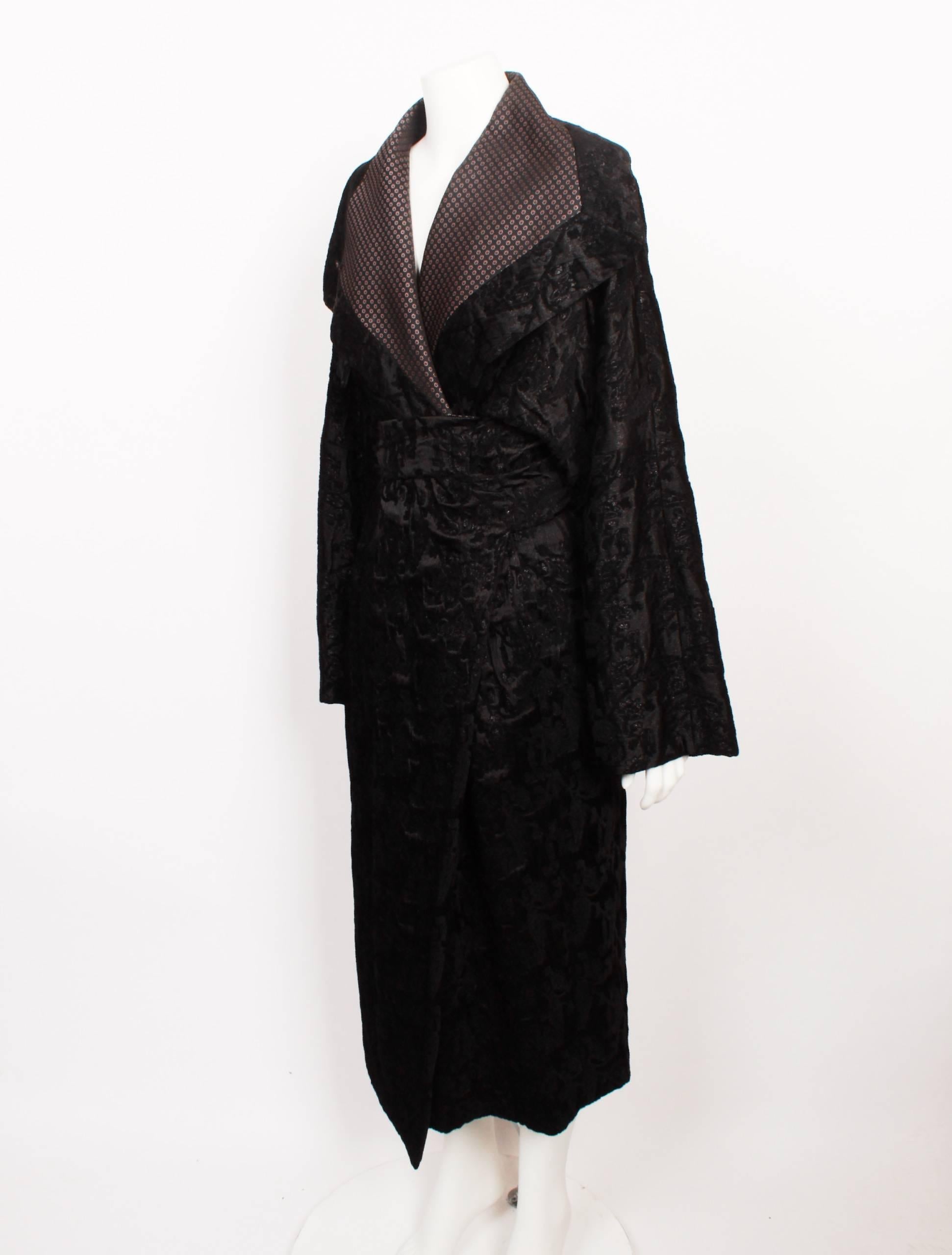 Black Brocade Coat. 

Antonio Marras made his first step into fashion in 1987, with his debut couture collection in 1996. His designs showcase his passion for handmade embellishment, rich colours and flamboyant decoration that stem from his