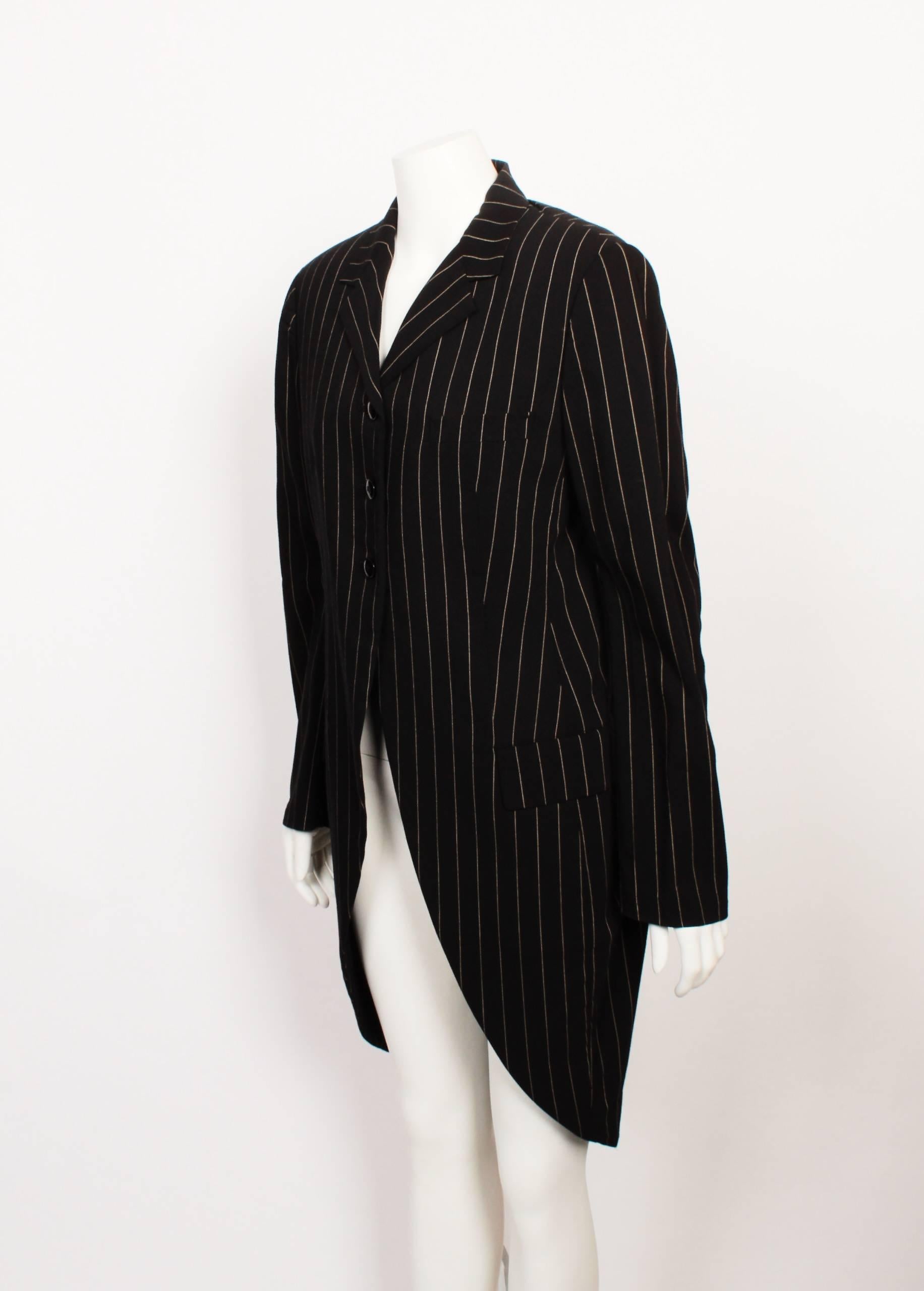 FINAL SALE

-Pinstripe Coat
-Longer back
-3 Button Detail

A master of draping, deconstruction and the avant-garde, the Japanese designer Yohji Yamamoto and his dark, over-sized aesthetic occupy a unique position in fashion. The hugely influential