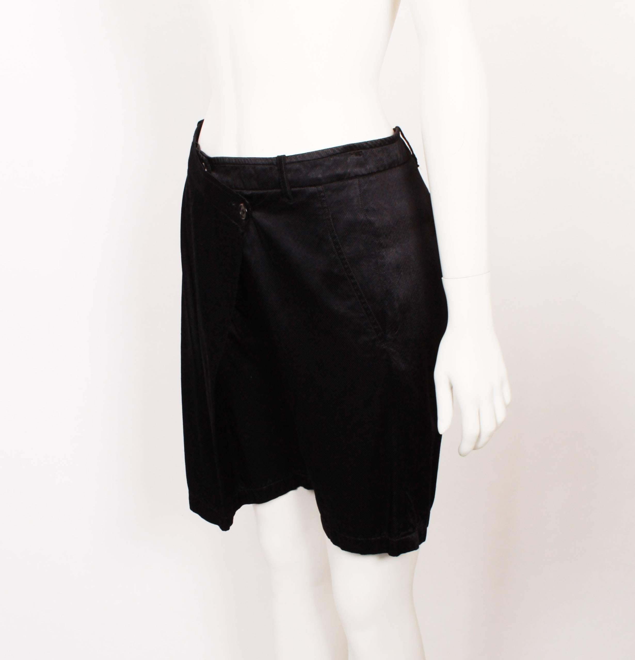 Double Layered Wrap SHorts

Ann Demeulemeester incorporates somber, moody hues juxtaposed with more vibrant tones in the collections. Reflecting the label's artistic sensibility,  slick-cut asymmetric accents and pieces with offbeat embellishments