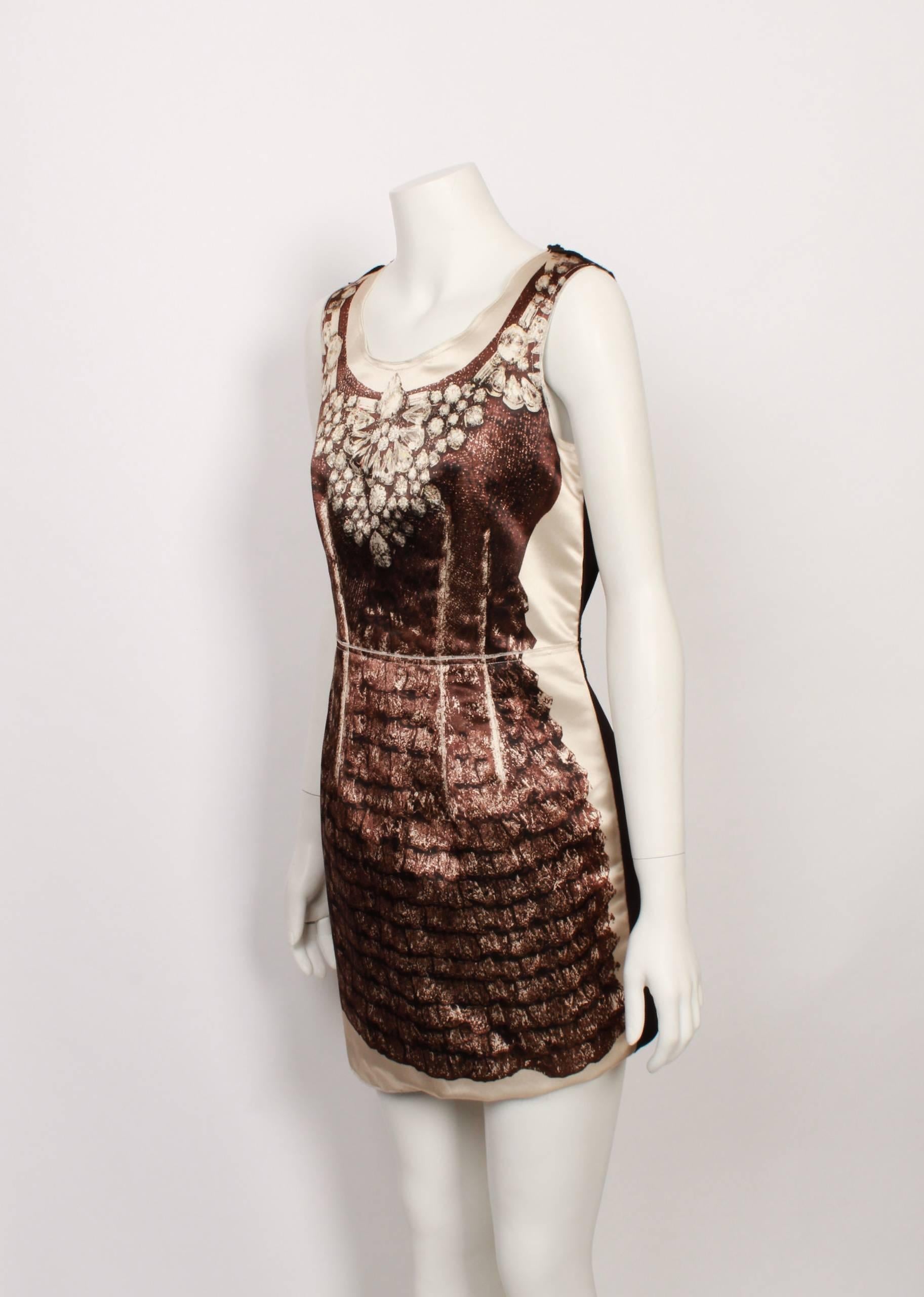 FINAL SALE

Dolce & Gabbana sleeveless satin mini dress features a stunning diamond necklace print on the front bodice and cute layered ruffle print on the skirt of the dress in luxe tones of ivory, chocolate and caramel. The back of the dress is